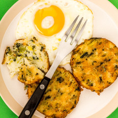 Cooked Vegetarian Bubble And Squeak Cakes With A Fried Egg