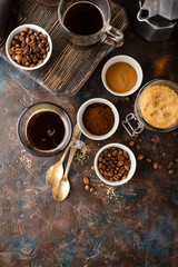 Fototapeta na wymiar Coffee with coffee beans, ground coffee and brown sugar