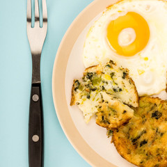 Cooked Vegetarian Bubble And Squeak Cakes With A Fried Egg