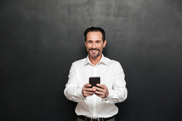 Portrait of a happy mature man dressed in shirt