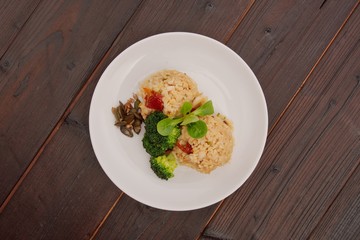 Rice risotto with vegetables on a table