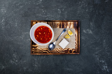 Saltwort with lemon in a white bowl.