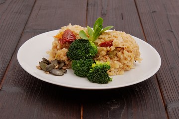 Rice risotto with vegetables on a table