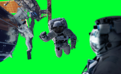 Astronaut working on a space station 3D rendering elements of this image furnished by NASA