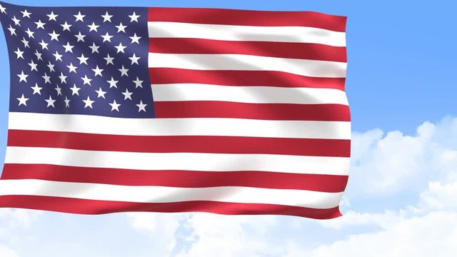 United States flag in motion with sky and clouds behind