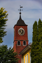 The red bell tower in Oregrund, Sweden towers over the surrounding buildings