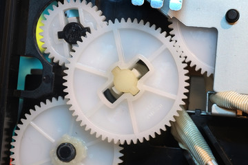 Gears, cogs and drive mechanism in modern inkjet printer.