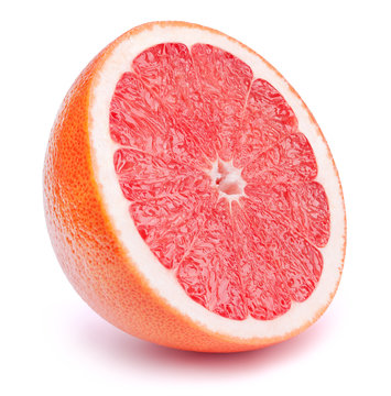 Perfectly retouched sliced half of grapefruit fruit isolated on the white background with clipping path. One of the best isolated grapefruits halves slices that you have seen.