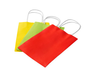 Colourful paper shopping bags isolated on white background