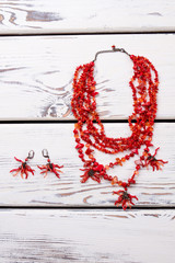 Little red beads jewelry. Necklace with polished stones.