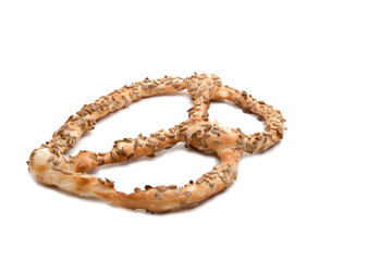 Pretzel with seeds isolated on the white