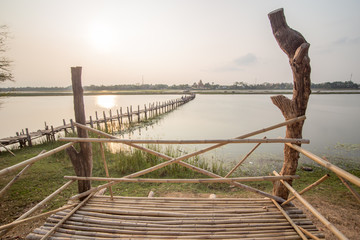 Obraz premium wood bridge cross a river