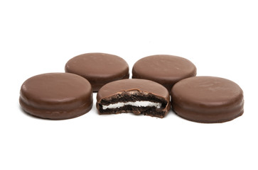 Obraz na płótnie Canvas chocolate biscuit sandwich in chocolate glaze isolated
