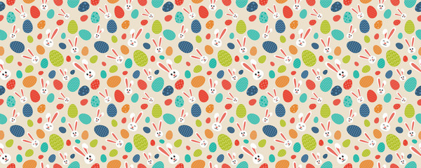 Seamless pattern with white bunnies and colorful eggs. Vector.