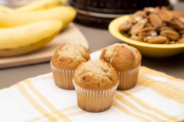 Classic Banana Nut Muffins in a Kitchen with Ingredients