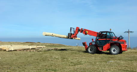 Fototapeta premium Forklift transport logs