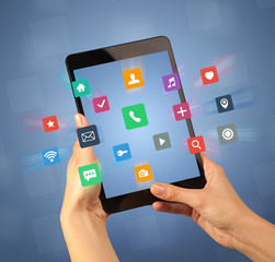 Female hand holding tablet