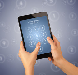 Female hand holding tablet