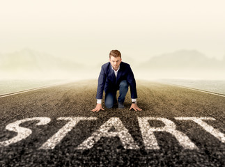 Businessman at start line