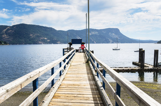 Narrow Jetty in Maple Bay, Vancouver Island, BC, Canada, on a Summer Morning.