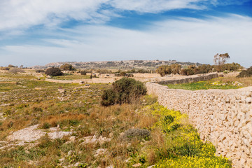 Mnajdra Temple within Hagar Qim megalithic complex. Ancient walls near Qrendi, Malta. UNESCO World Heritage Site.
