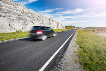 Car on road in Norway, Europe