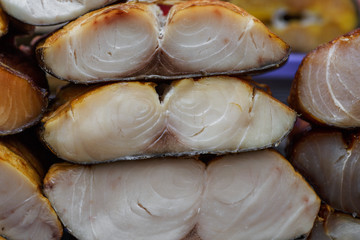 Smoked tuna fish steaks, prepared seafood close up