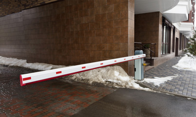 Automatic barrier gates to entry the courtyard of the building