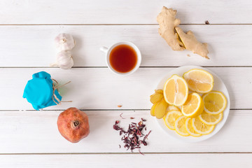 cold tea fruits on white wooden table