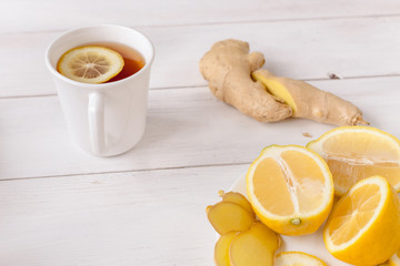 cold tea fruits on white wooden table