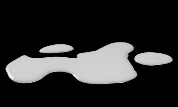 Milk splashes isolated on black background, clipping path