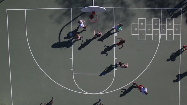 Outdoors Basketball Court Action on Sunny Day 002