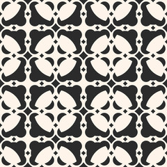 Fototapeta premium Abstract geometric ornament. Black and white seamless pattern, carved lattice