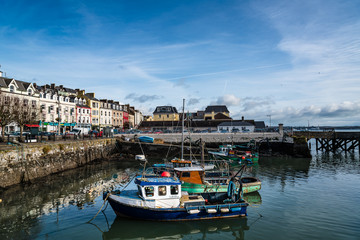 Fototapeta na wymiar Waterfront and harbour with fishing boats in Ireland