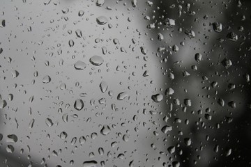 Rain drops on glass window.