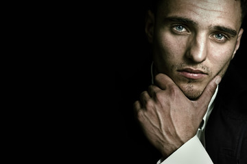 Dark face portrait of elegant masculine man