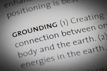 The word Grounding close up on paper