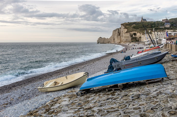 Fototapeta premium Boats on the beach of Étretat in Normandy, France.