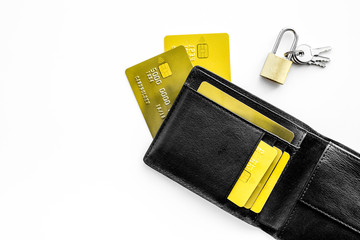 Protection of banking transactions. Bank cards near lock and keys on white background top view copy space