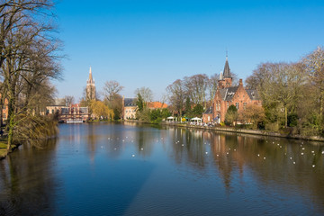 Fototapeta na wymiar View on the so-called Lake of Love (Minnewater) in the centre of Bruges