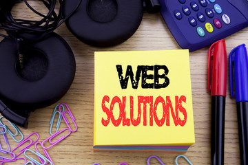 Word, writing Web Solutions. Business concept for Internet Design Plan written on sticky note paper...