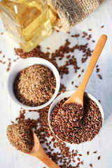 linseed oil and flax seed on the table