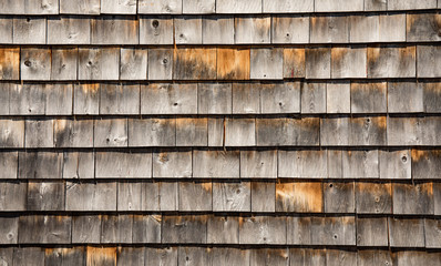 A shingled wall for a texture and patterned background.