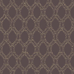 Seamless golden dotted ornament. Modern background. Geometric modern pattern