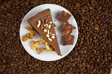 chocolate cheesecake on white plate on  wooden table