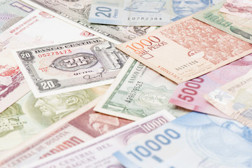 Fototapeta na wymiar South America paper currencies background .