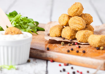 Fried crispy chicken popcorn with fresh salad © DenisMArt