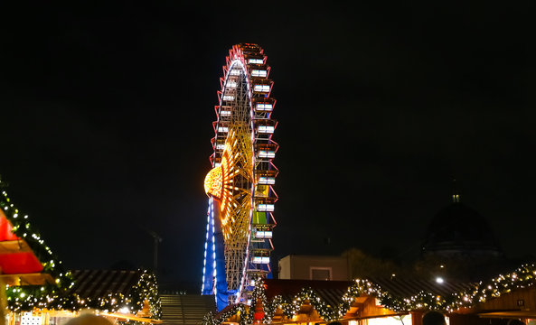 Ferris Wheel in Neptunbrunnen Christmas Market in Berlin, Germany