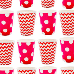 the Card with Red paper disposable glass in polka dot and zigzag isolated on white with copy space
