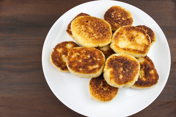 Cheesecakes on a wooden background
